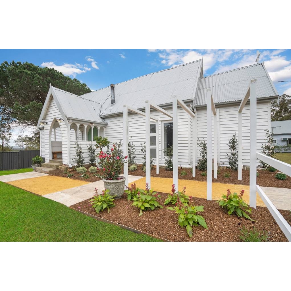 'It's full of character' Converted church at Ellalong could be yours