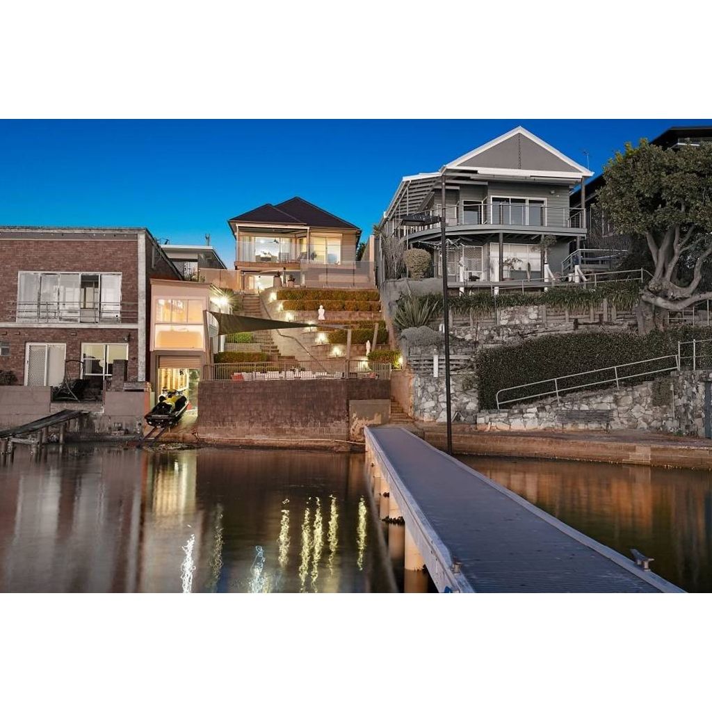 Boatie's dream house Belmont waterfront property with jetty listed for