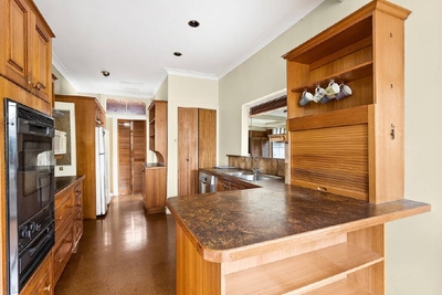'A lot of buyers loved it': Original West Wollongong home's retro appeal a hit at auction